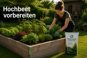 Gardener wearing gloves tends herbs in a wooden raised garden bed; a 5 kg bag of Verde Fortis Bodenbooster sits nearby.